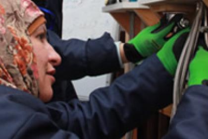 Photo exhibition shows enterprising migrants and refugees