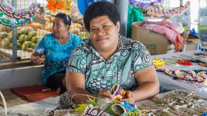 Women in Fiji sell crafts to tourists